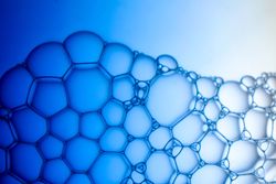 Abstract background bio technology, macro photography foam and water with gradient background. Molecule multicolor backgorund
