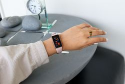 Cropped image of woman's hand with smartwatch 5pKNg0