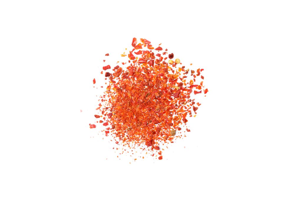 Pepper powder spice isolated on blank background