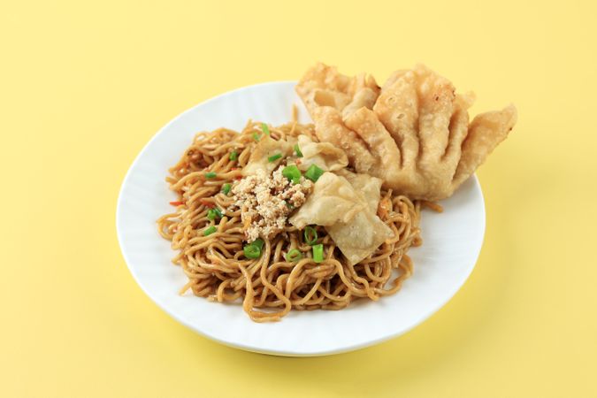 Mie Gacoan, Popular Spicy Indonesian Fried Noodle  with Fried Dumpling.