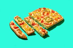 Focaccia primavera minimalist on a green background