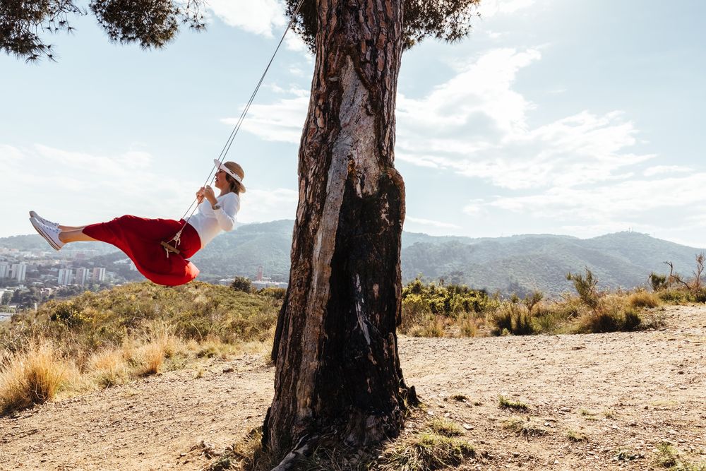 Woman having fun on a swing