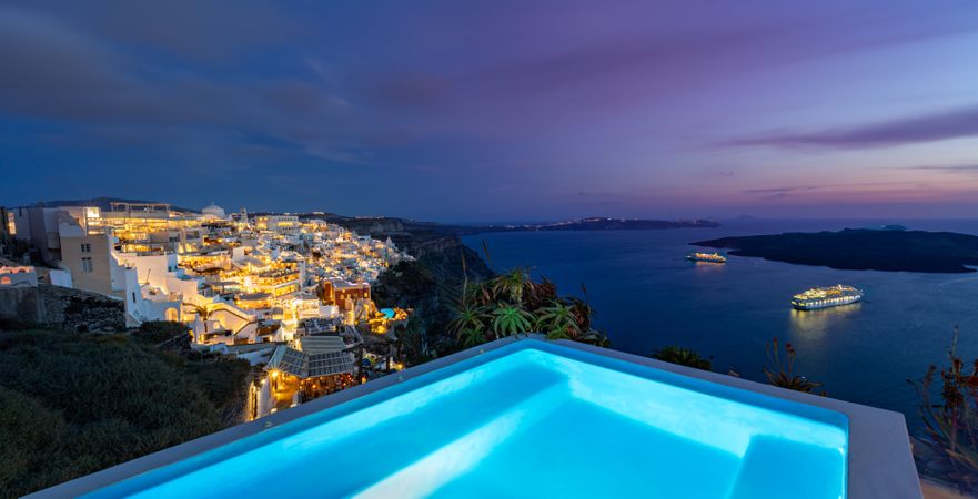 Pool at night over looking Aegean Sea