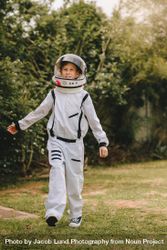 Kid pretending to be an astronaut 0yA1a0