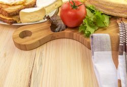 Plate and wooden platter with food