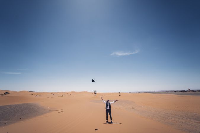 Bearded cowboy in desert
