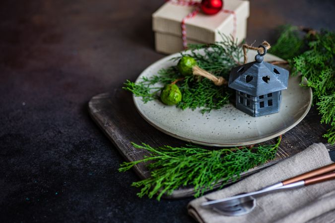 Christmas holiday concept with ornament on grey plate