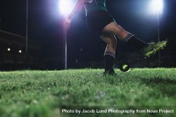 Rugby player kicking the ball from a tee for penalty shot 4jnNX4