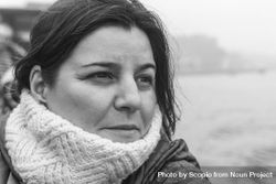 Portrait of middle aged woman wearing a scarf in grayscale 0yMk10