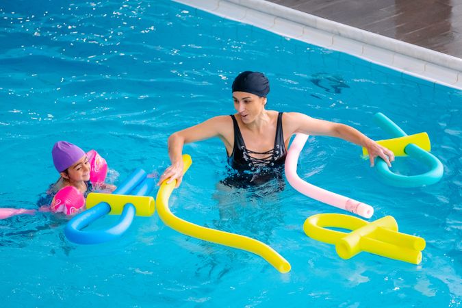 Women and girls in swimming pool