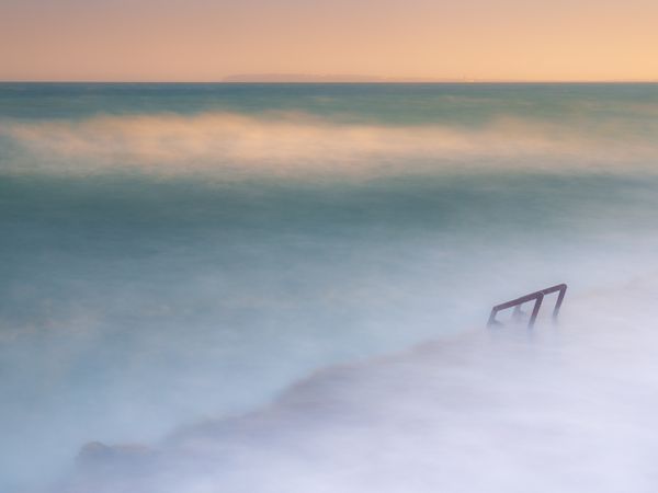Cloudy fog over waving sea