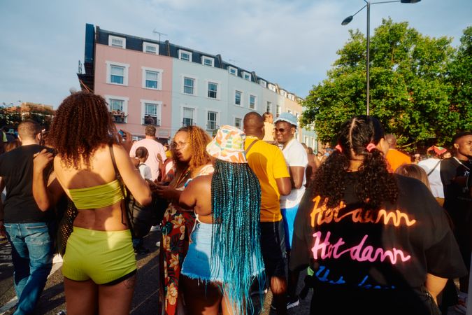 London, England, United Kingdom - August 27, 2022: Group of people in colorful clothes at carnival