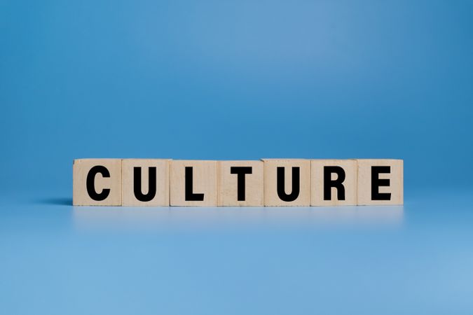 culture word text on wooden blocks isolated on blue background