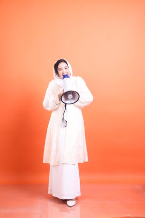 Vibrant advocacy, a woman in hijab amplifies her message
