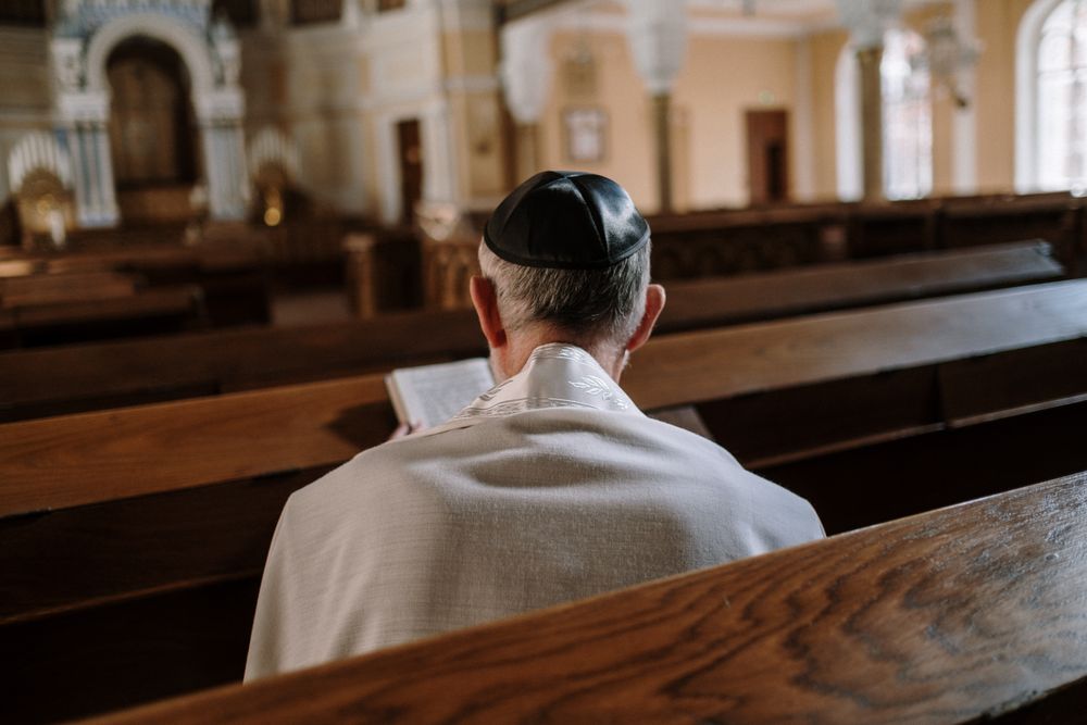 Back view of priest at the church