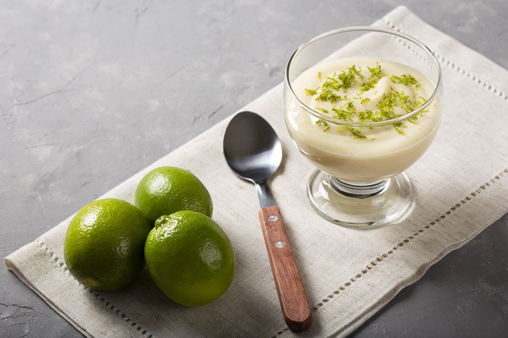Lemon mousse with lemon zest on top.