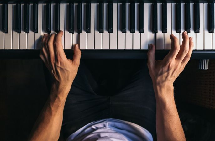 man playing piano. top view.