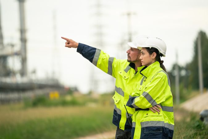 Engineer worker checking project at petrochemical factory
