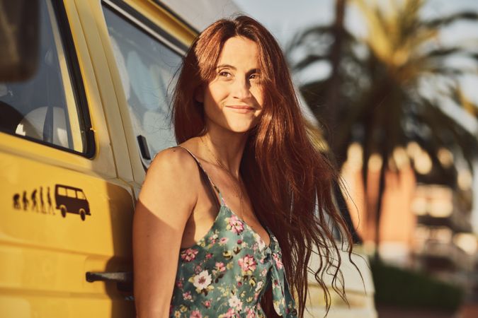 Young woman on a yellow van