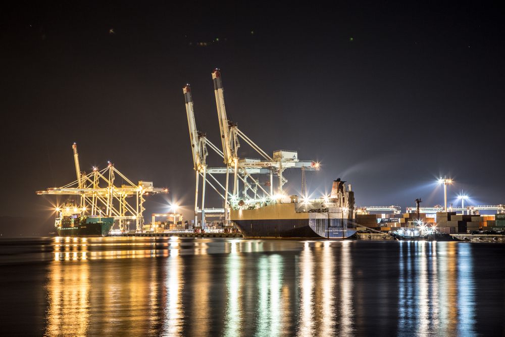 Lit seaport during night time