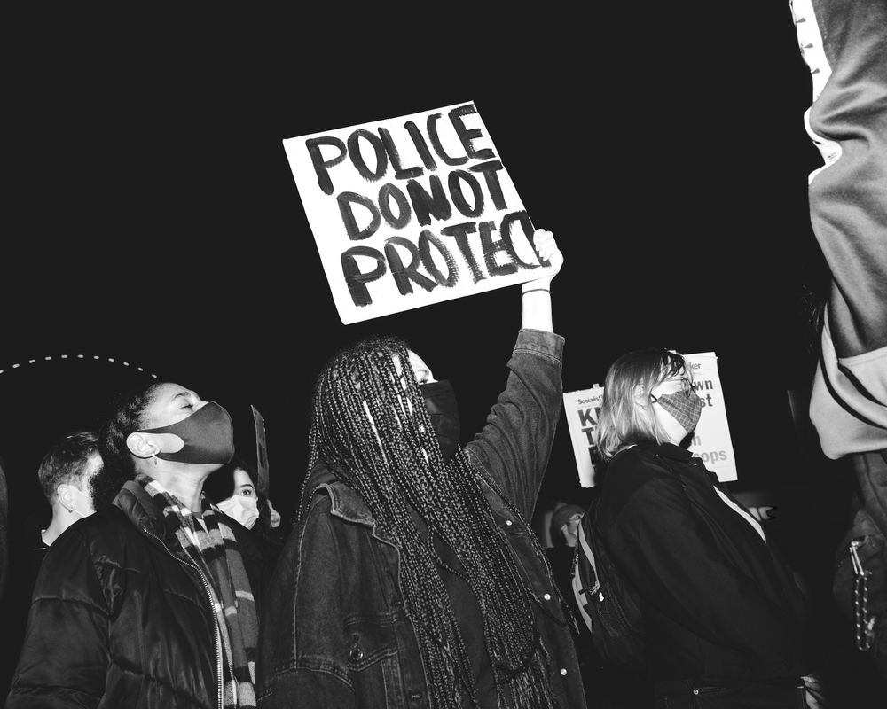 London, England, United Kingdom - March 16, 2021: Group of multi-ethnic female protesters