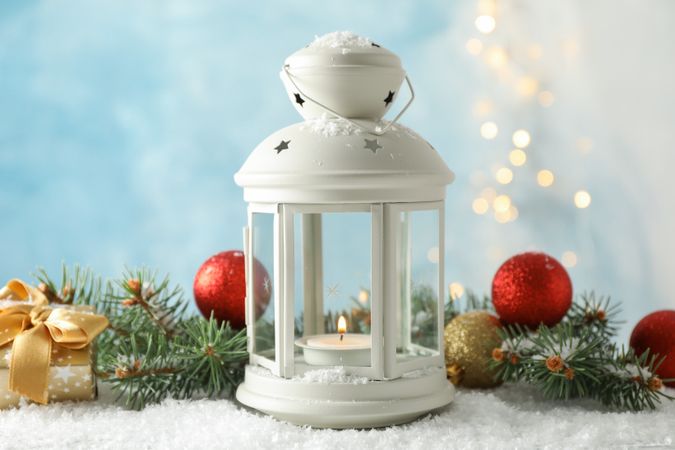 Christmas lantern on decorated background, space for text