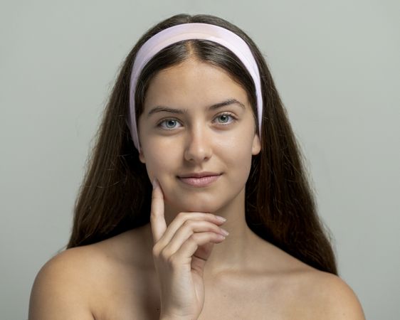 Natural beauty and healthy skin in skincare concept; beauty portrait of young woman with direct gaze.