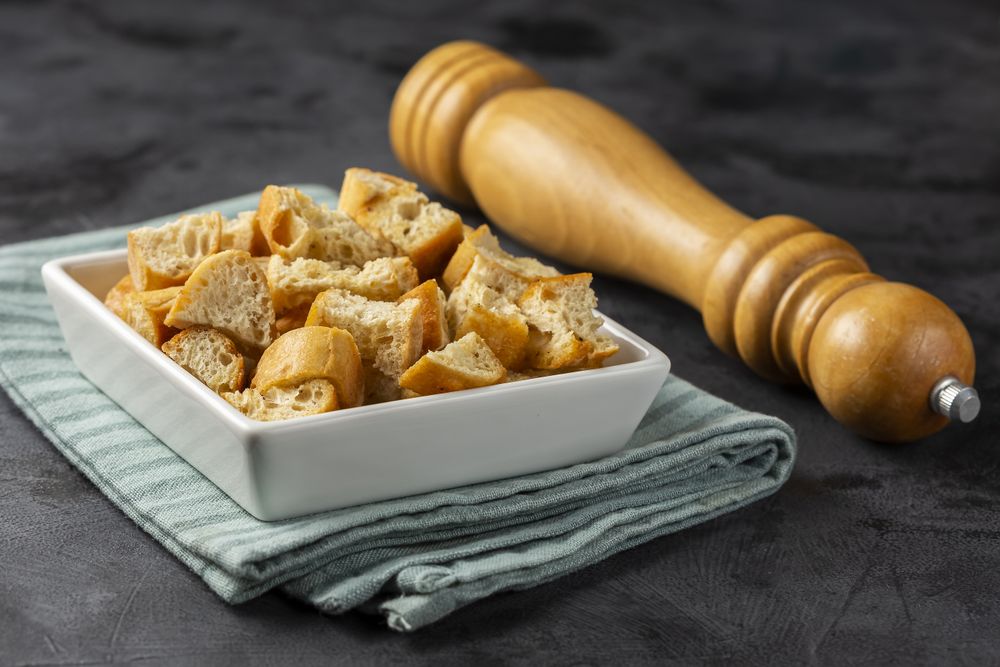 Delicious crunchy croutons on the table.