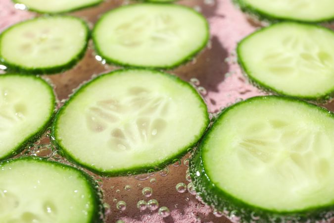 Slices of cucumber in sparkling water