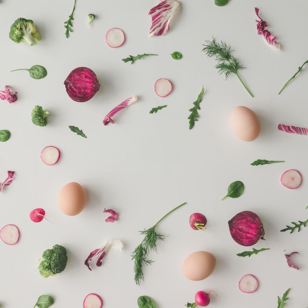 Colorful vegetable pattern made of broccoli, eggs, beetroot and radish