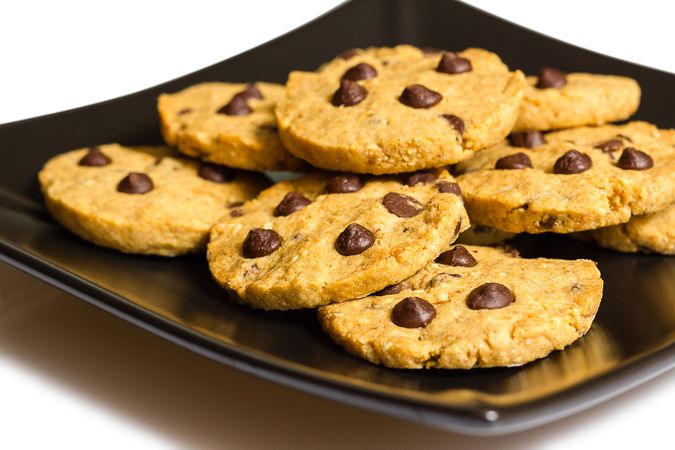 Chocolate chip cookies on a plate isolated on plain background