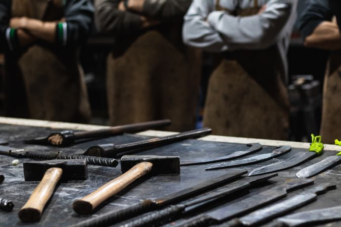 Different metal sharp tools at workbench