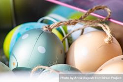Easter concept with ornamental eggs in box 5Q23Xm
