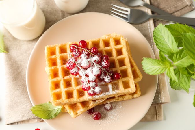 Beautiful composition with sweet waffles, top view