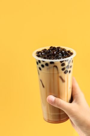 Female Hand Holding Bubble Tea Boba Drink