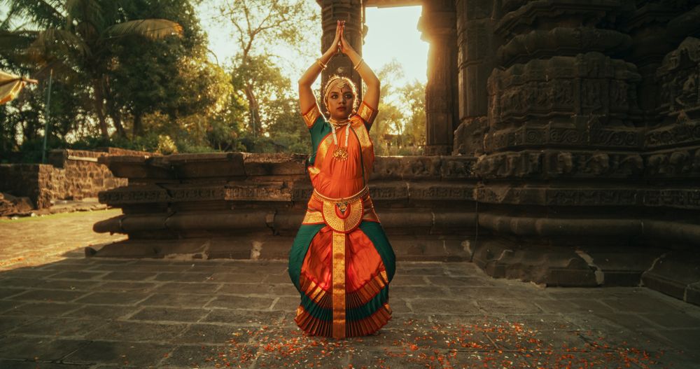 Expressive Young Female in Colourful Traditional Sari Dancing Folk Dance Choreography