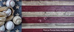 Baseball season with used balls and leather glove on vintage USA wooden flag bG7kBb