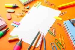 Composition with school supplies on color background, space for text