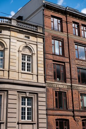 Facade of European buildings on sunny day