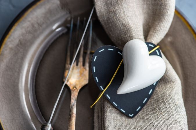 Close up of table setting with heart ornaments