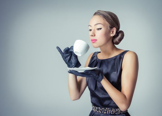 Vintage female model with coffee cup
