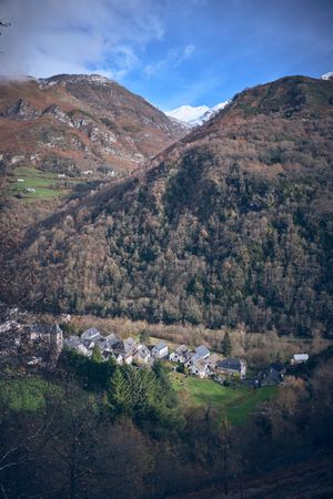 Scenic view of small village in mountains