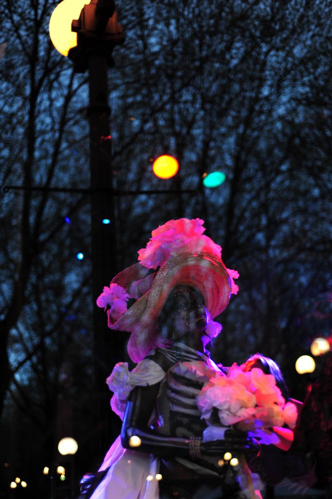 Reflection of woman in Day of the Dead bridal gown