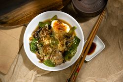 Tasty noodles with egg seeds and herbs