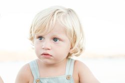 Adorable kid resting at beach