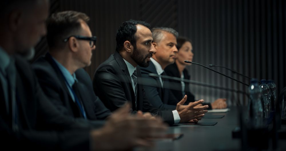Middle Eastern Male Head Of Political Delegation Speaking At International Economic Forum Press Conference.