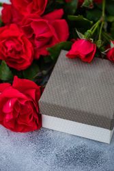 Red roses with small gift box