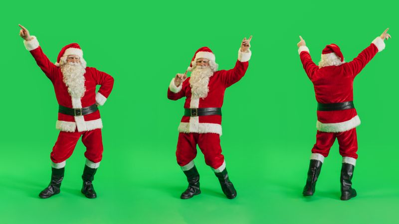 Studio Shot Isolated Mockup Template: Jolly Santa Claus Dancing On Green Screen Chromakey Background, Celebrating Christmas, New Years, Holiday Season. Happy And Joyful Celebration