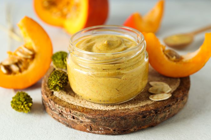 Skin care and face care concept - pumpkin cosmetic