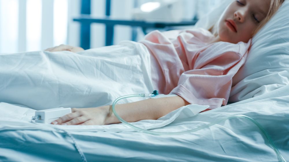 Cute Little Sick Girl Sleeps on a Bed in the Children's Hospital
